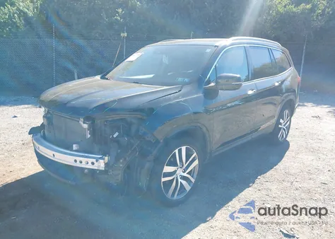 2016 Honda Pilot Touring z USA, uszkodzony, nr VIN 5FNYF6H91GB052613